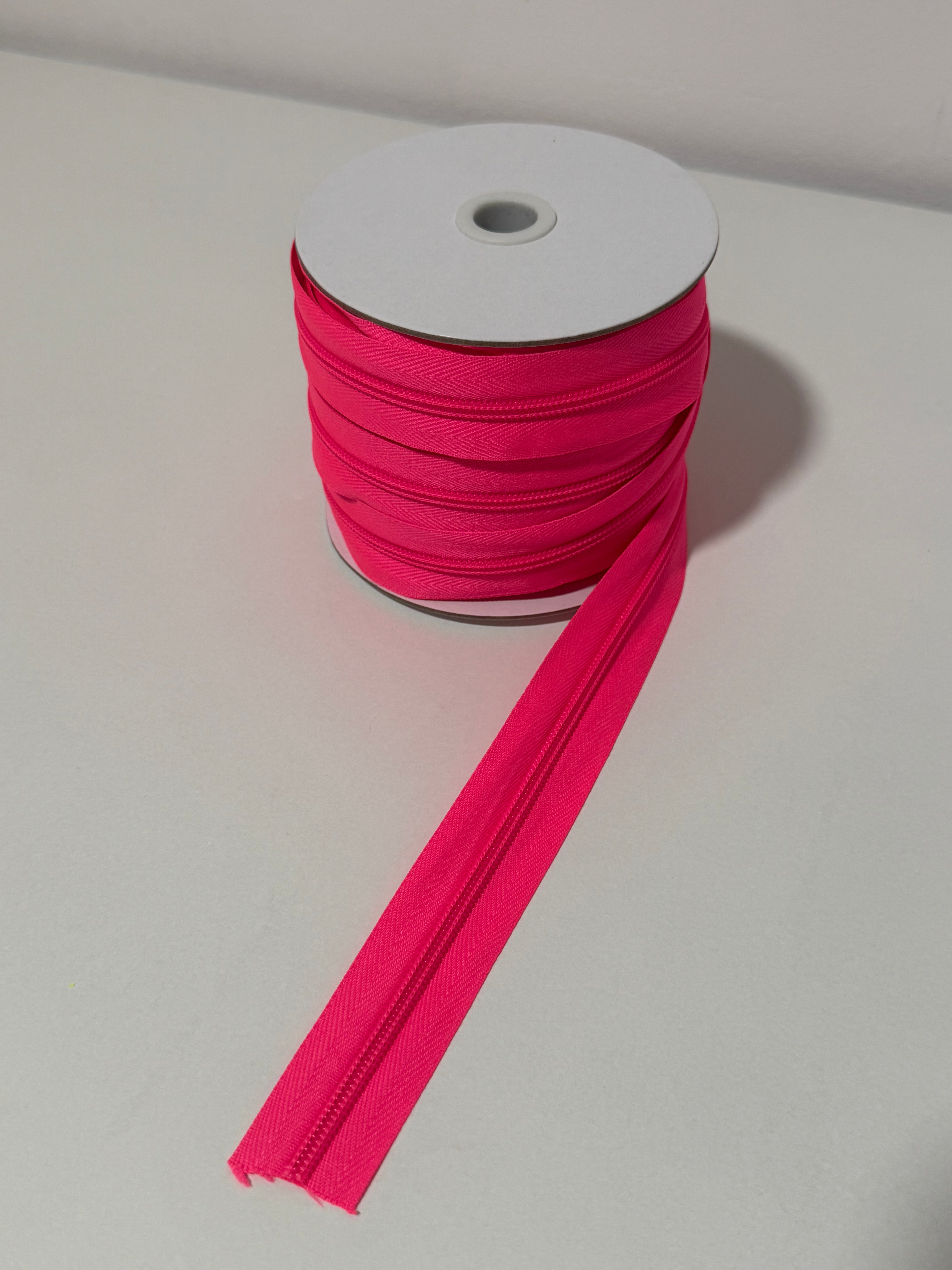 Cremallera rosa fluor M5.
